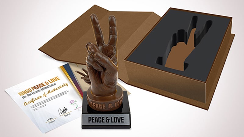 Life sized art sculptures of Ringo Starr’s hand sign being auctioned
