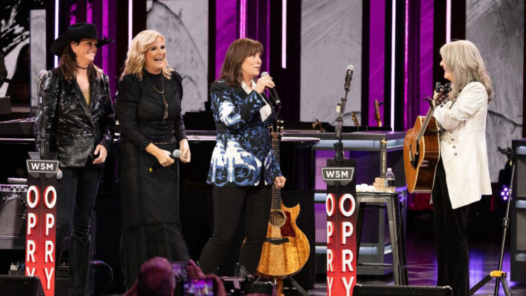 Kathy Mattea invites Suzy Bogguss into the Grand Ole Opry after own induction